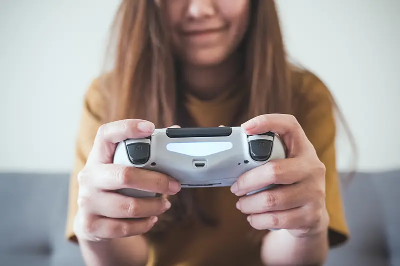 Child, holding a video game controller